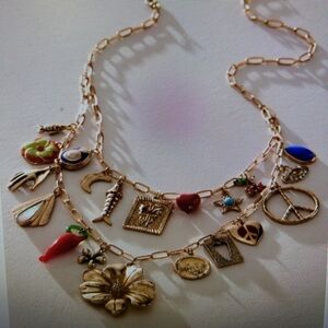 Free People gold flower power necklace with multiple charms